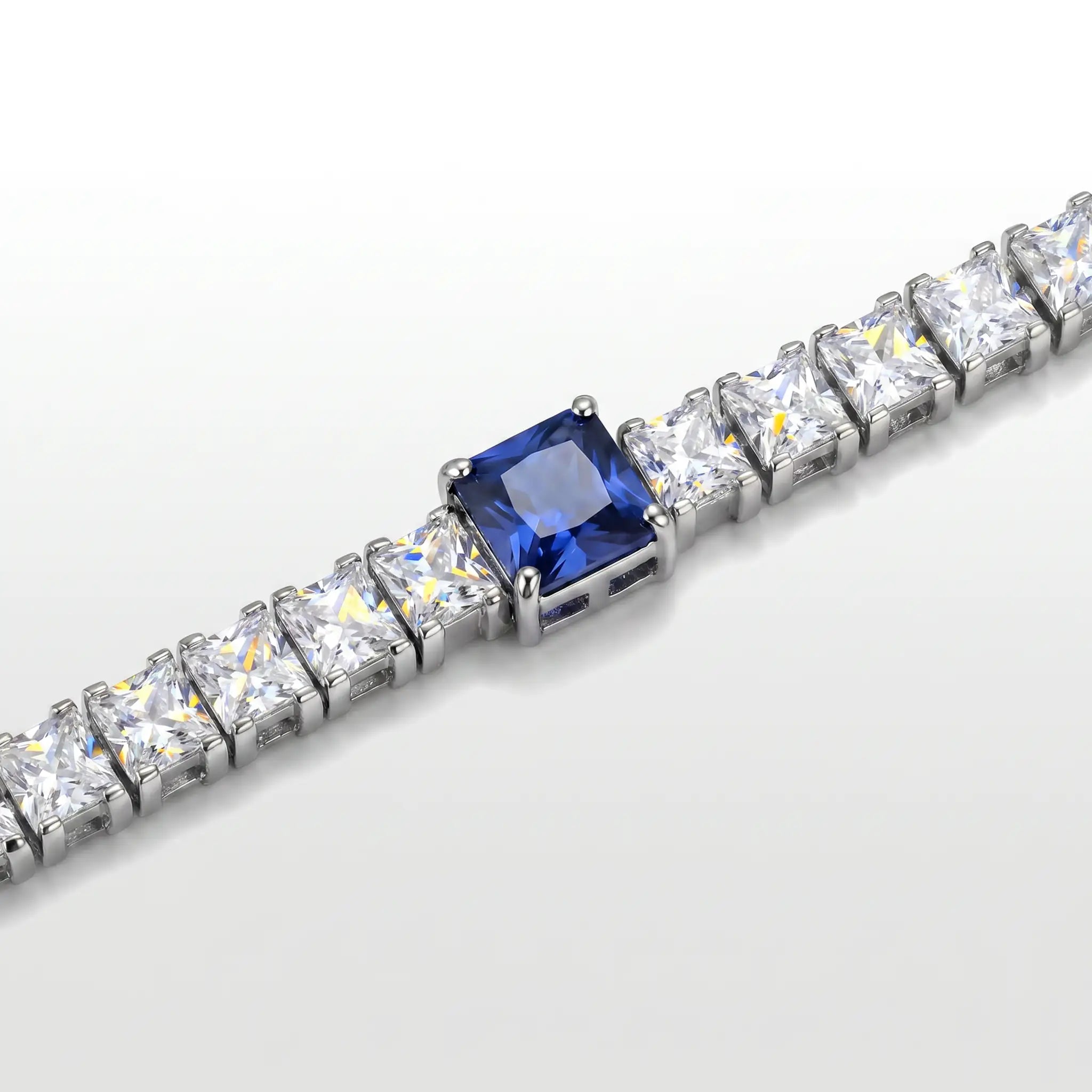 PULSEIRA GLOW RIVIERA ZIRCÔNIA BRANCA 5MM E UMA AZUL 7MM GARRA QUADRADA FECHO DOBRÁVEL COM EXTENSOR