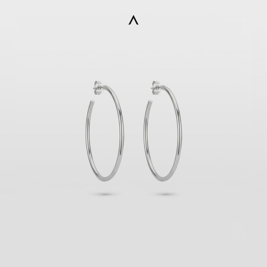 BRINCO ARGOLA OVAL EM AÇO POLIDO