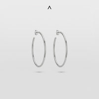BRINCO ARGOLA OVAL EM AÇO POLIDO