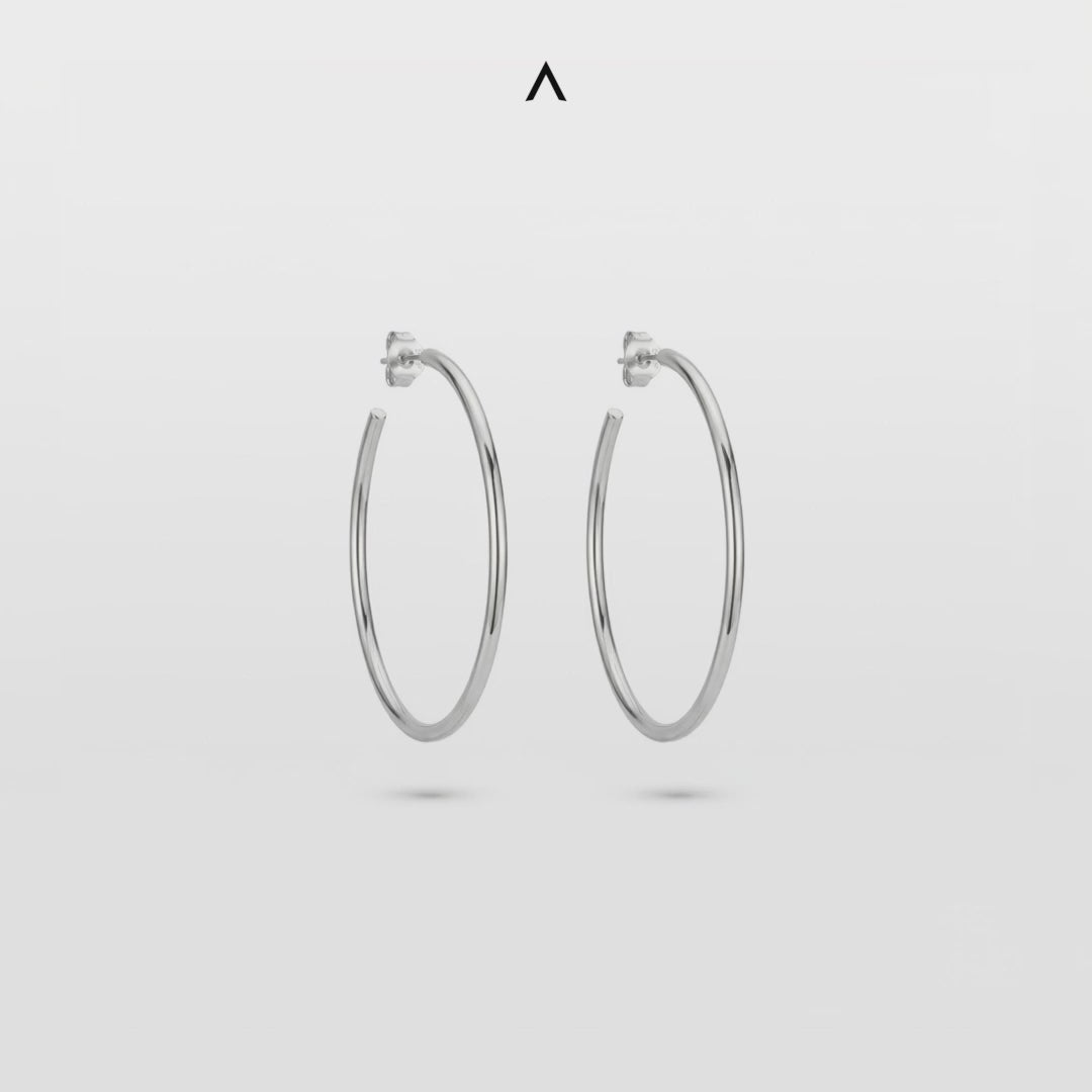 BRINCO ARGOLA OVAL EM AÇO POLIDO